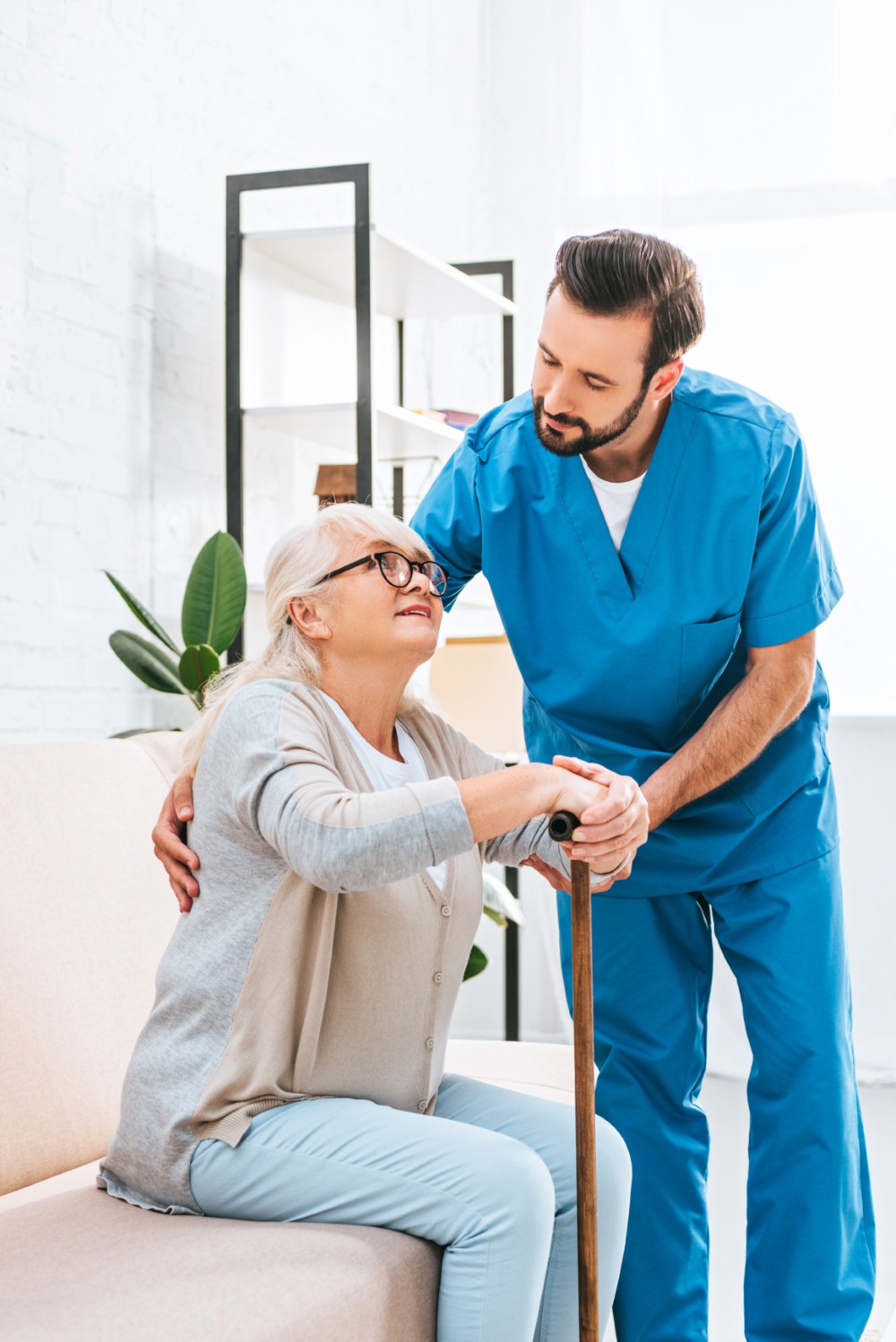 A caregiver supporting an older adult in New Haven
