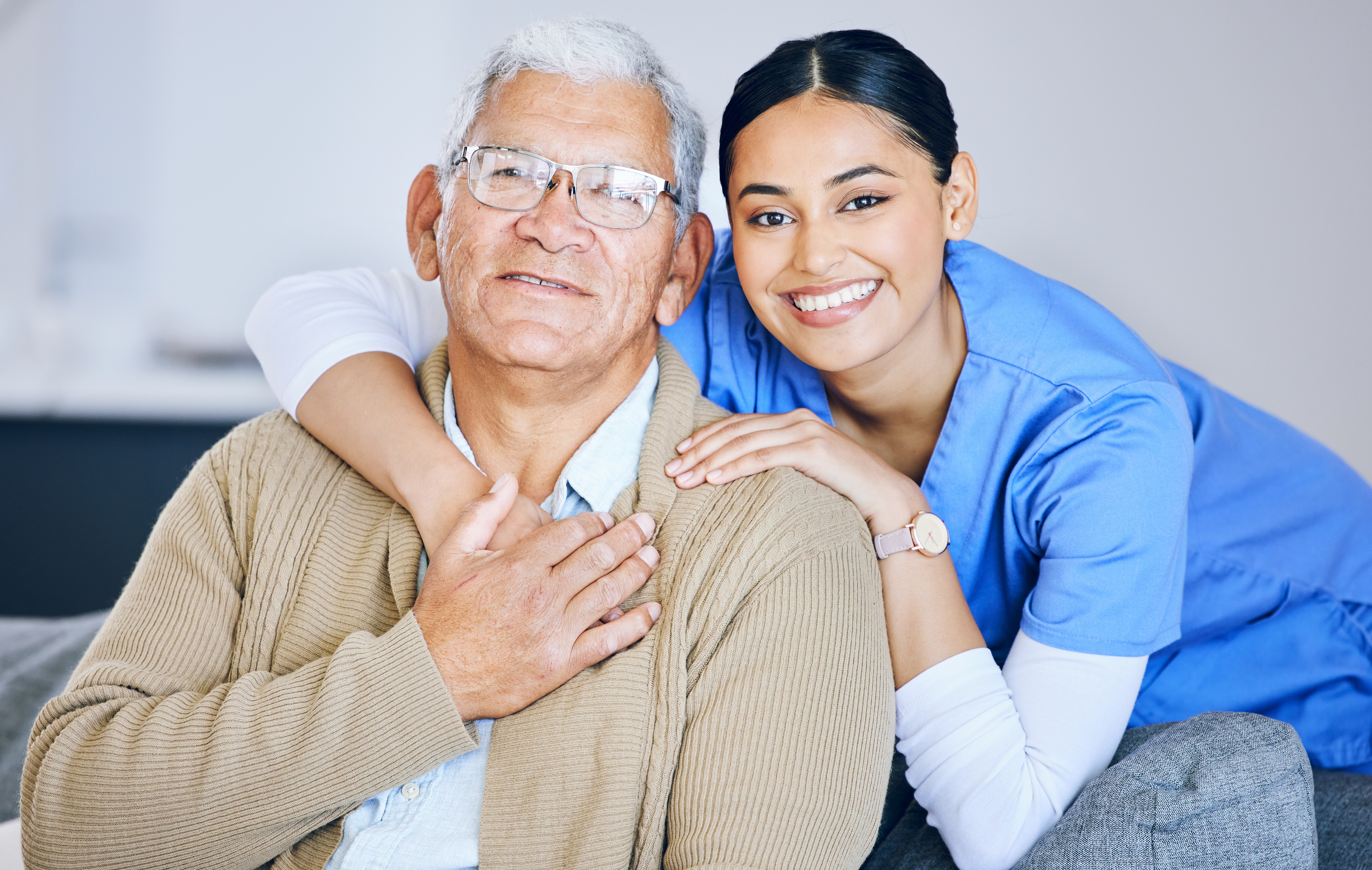 A caregiver speaking with an older adult